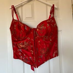 Red satin Bustier with gold accents. Hook and eye closure in front & laces back
